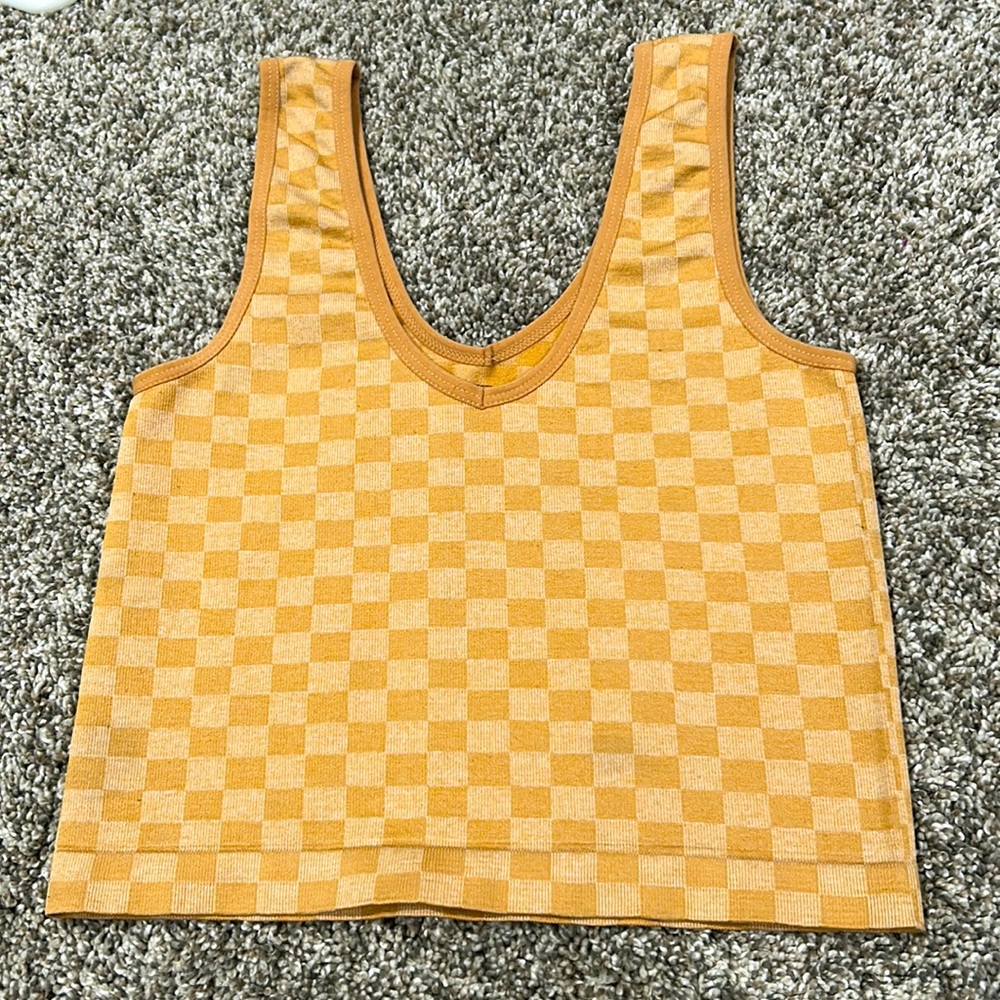 Dark and light orange checkered cropped tank top. Fits size XS-S